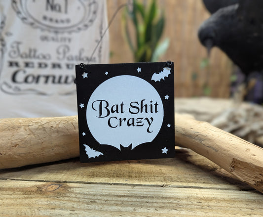 Bat sh*t crazy sign